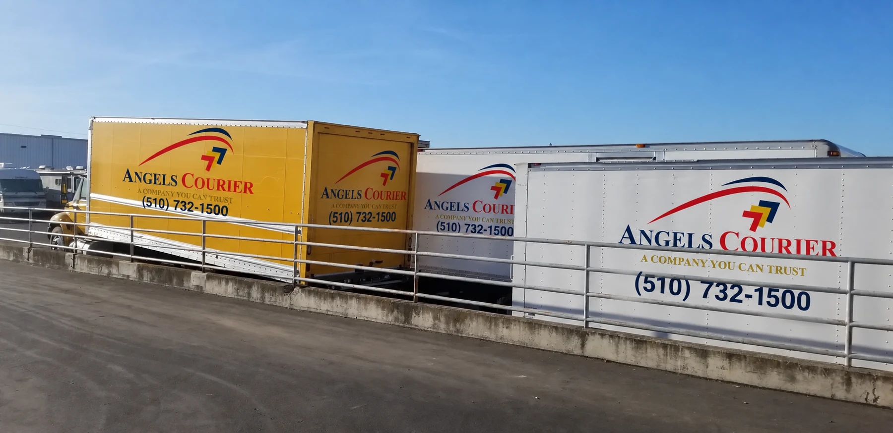 Angels Courier box trucks with current branding